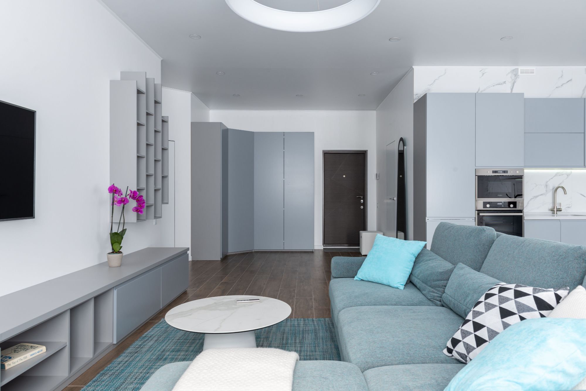 Contemporary living room with modern blue furnishings
