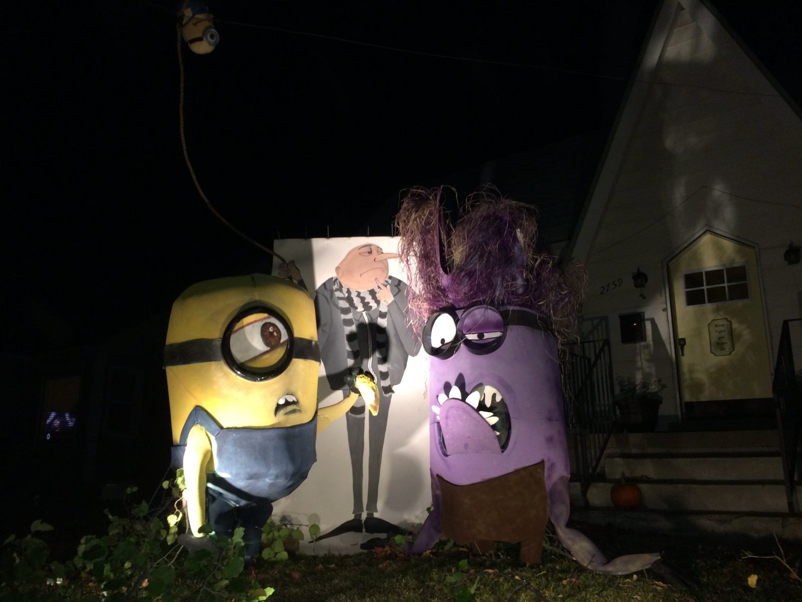 Despicable Me-themed Halloween yard display with Gru and Minions at a Highland Park home in Salt Lake City