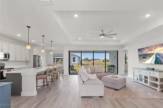 Open kitchen and living room in a Bahnam Builders Cavallino-B home