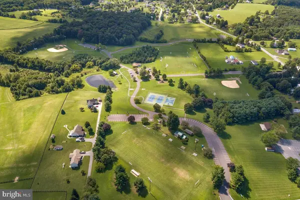 Aerial view of Deer Park in Westminster, Maryland, showing fields, courts and green space