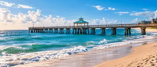 Deerfield Beach International Fishing Pier and sandy beach in Deerfield Beach, Florida