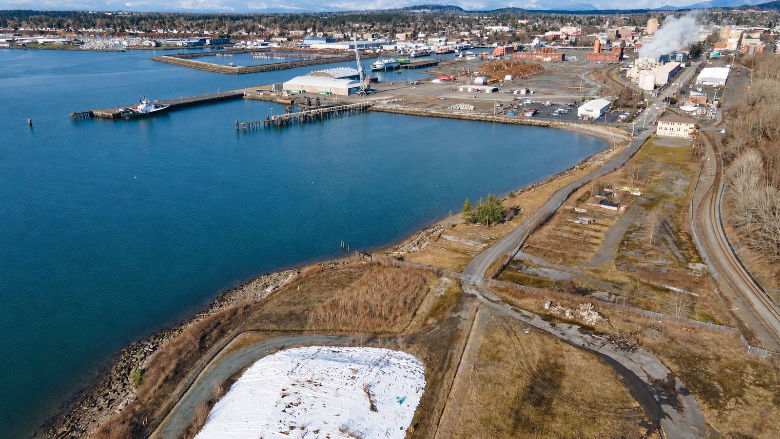 Aerial view of the Salish Landing park site at the foot of Cornwall Avenue on the Bellingham waterfront, looking toward downtown Bellingham.
