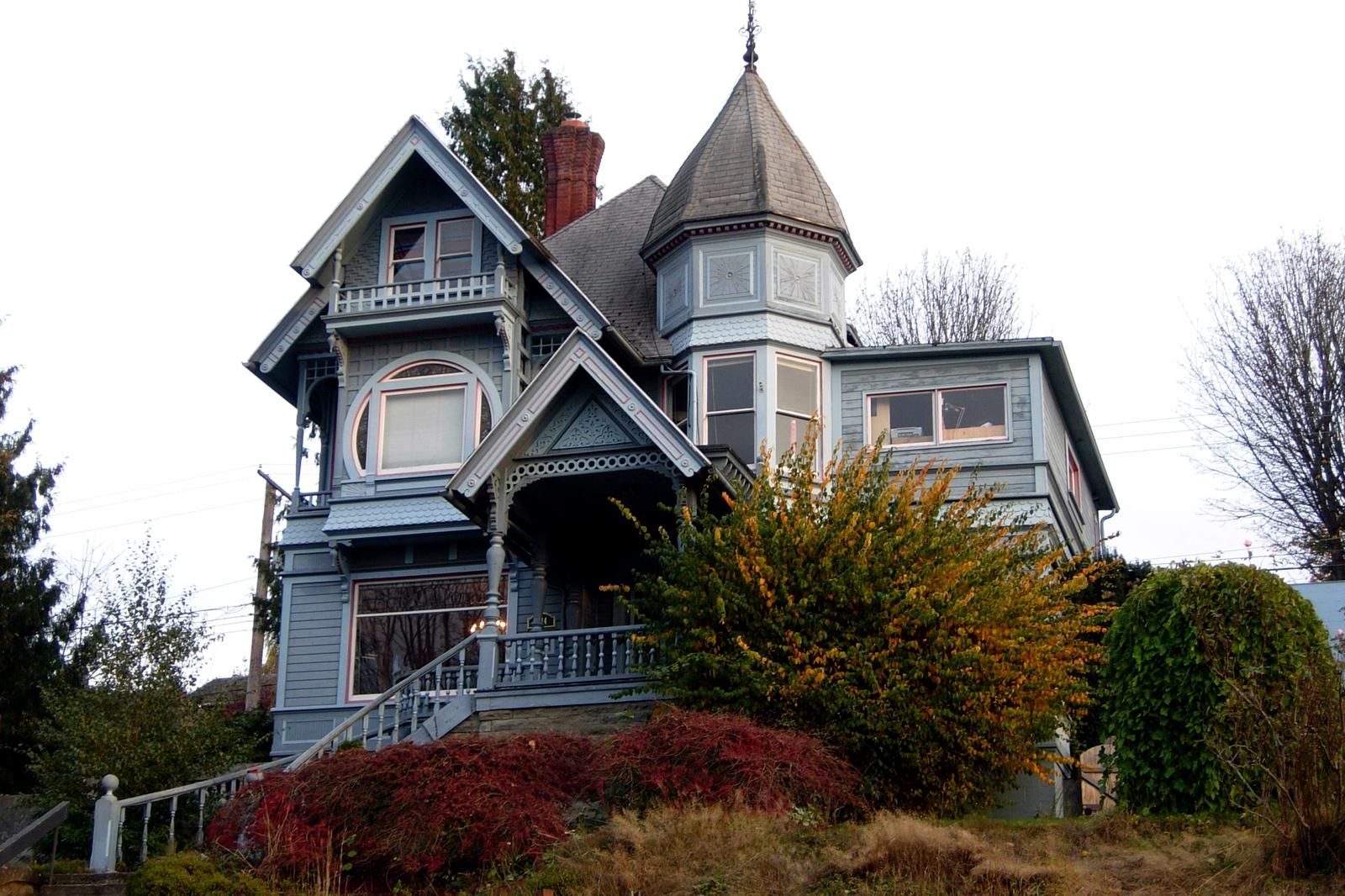 A restored Queen Anne home with a turret, typical of the historic architecture in South Hill, Bellingham, WA
