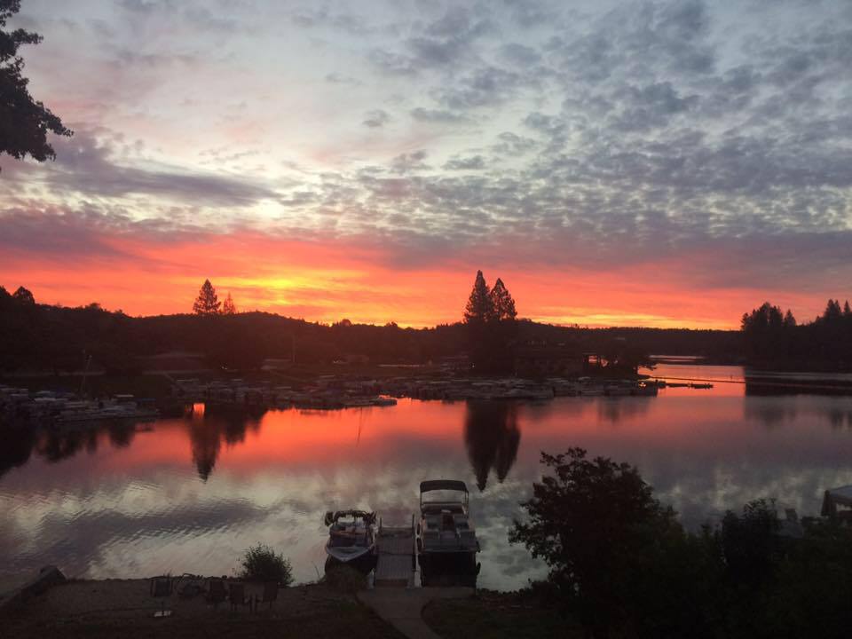 Sunset over the water at Lake of the Pines, a gated Nevada County lake community