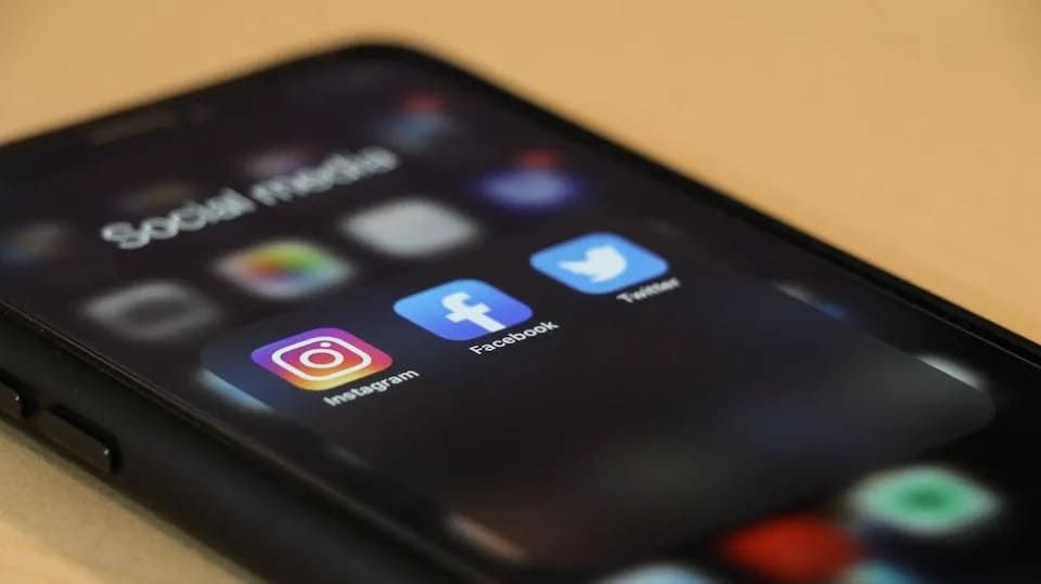 A smartphone screen showing social media apps