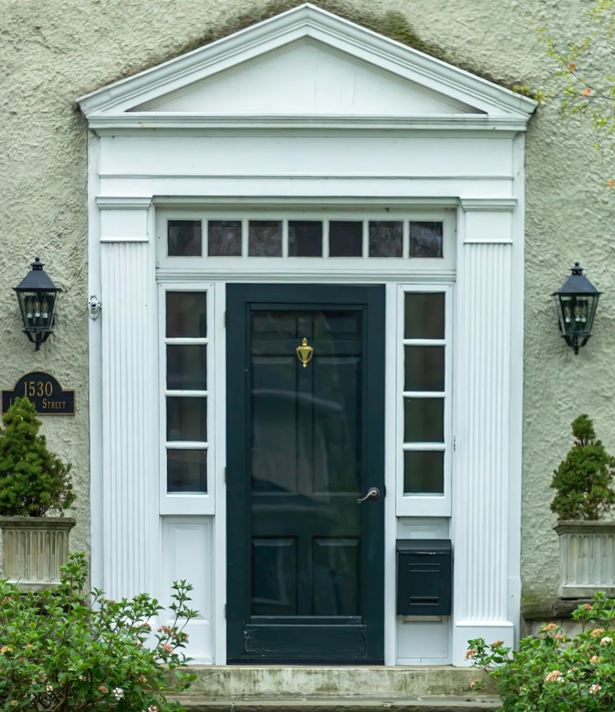 White house with pedimented front door