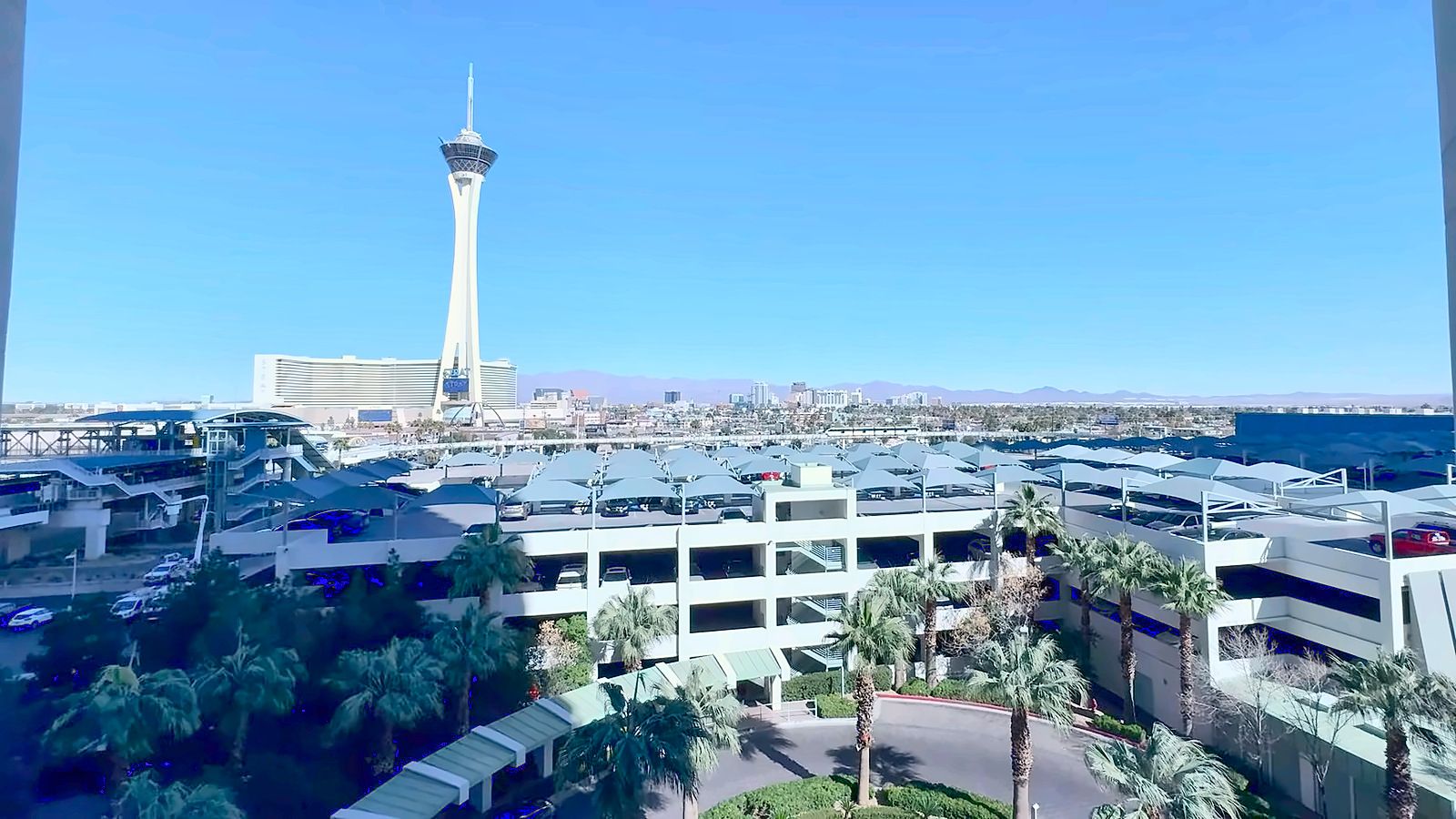 View of the Strat tower, downtown Las Vegas and the mountains from a Turnberry Towers terrace