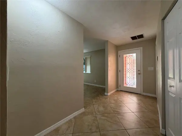 1013 INDIAN OAKS E, Holly Hill, FL 32117