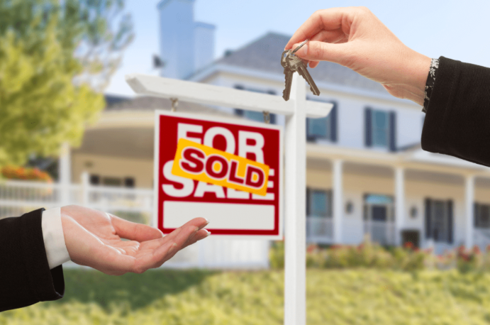 Sold house keys in Harrisonburg summer real estate market.