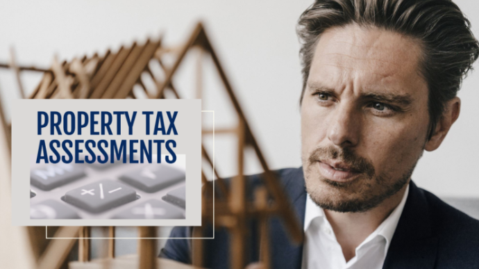 Handsome man reviewing Harrisonburg property tax assessments.