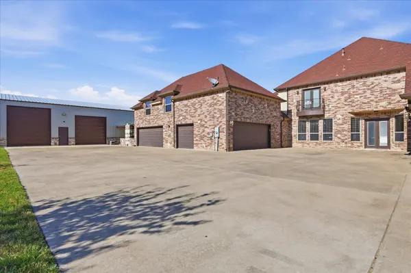 feature image of Six Garages, a Workshop, and Room for Whatever You Love Most