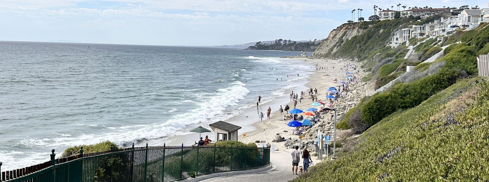 The walkway down to Strands Beach in Dana Point, California, with bluff-top homes above the sand