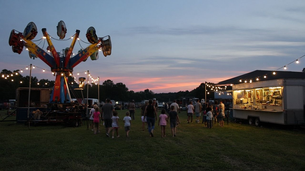 Families enjoying a hometown fair near Hollywood, Maryland