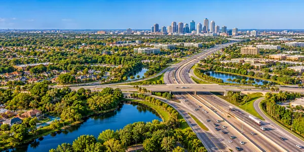Sunlit Highway to the Downtown Skyline