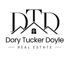 Dory Tucker Doyle Real Estate Logo with the letters DTD with a roof and window and two mountains