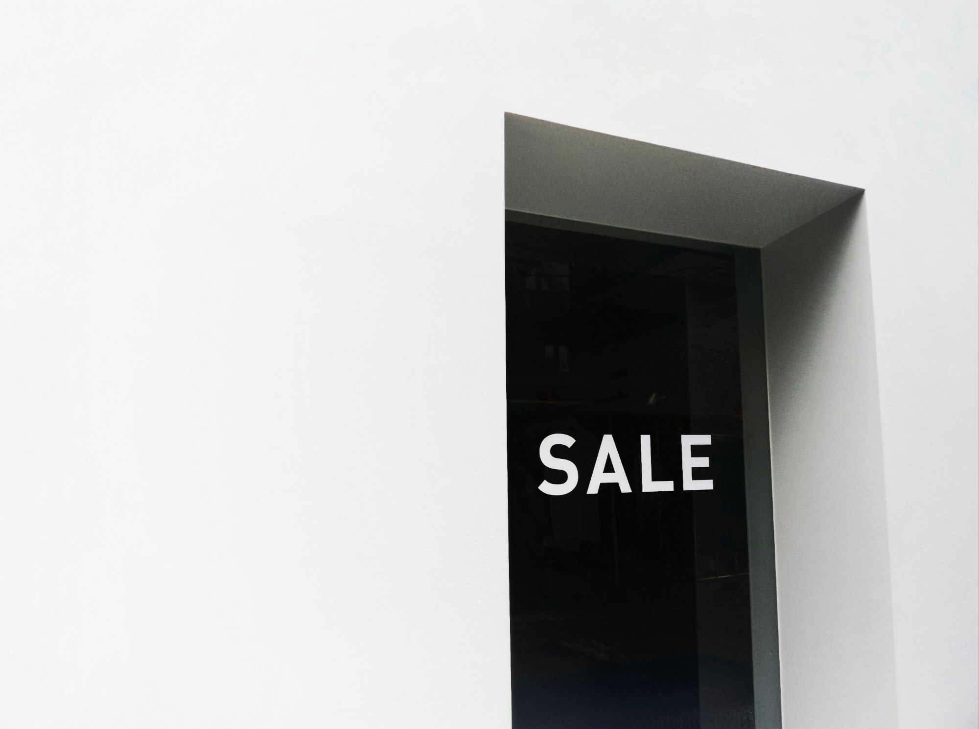 Modern home with a sale sign representing homes for sale in Las Vegas