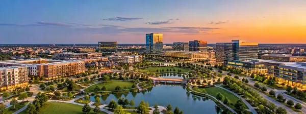 Sunset Over a Modern Lakeside District