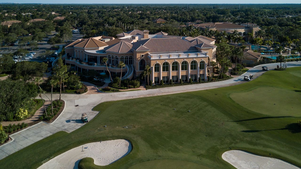 Florida golf course with lakes and lush landscaping representing the Mirasol country club setting in Palm Beach Gardens
