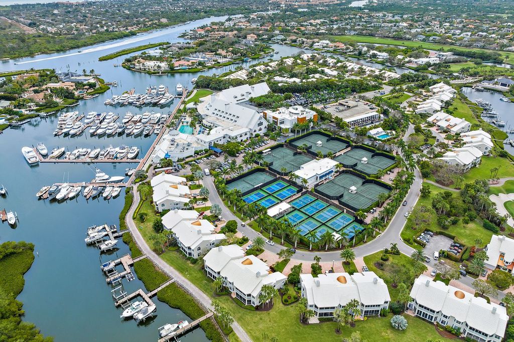 Aerial view of Admirals Cove marina and waterfront community in Jupiter Florida