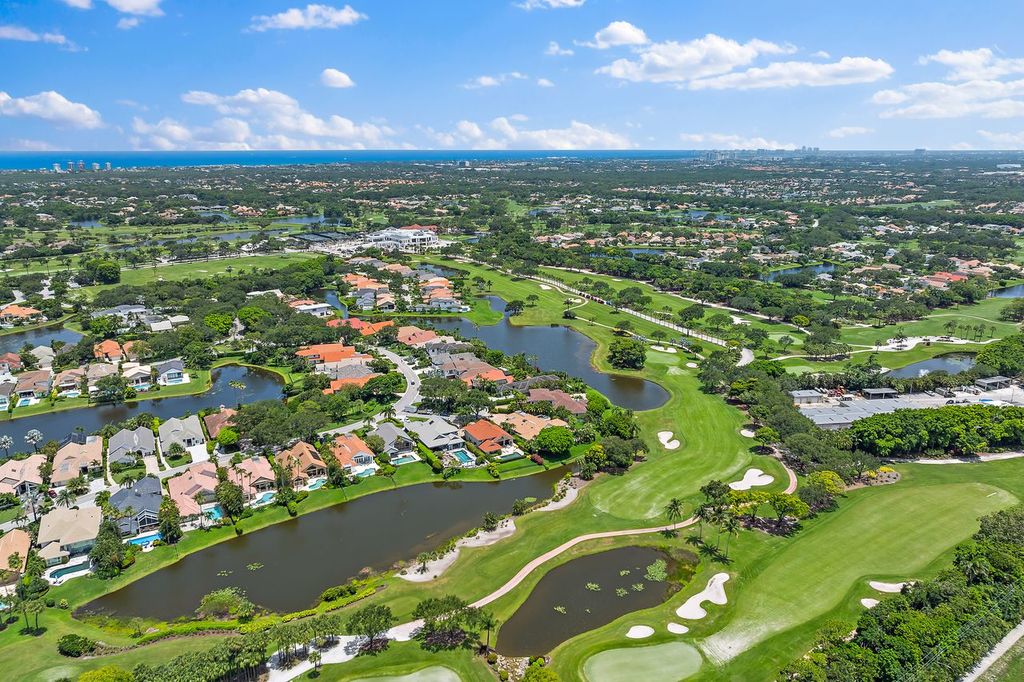 Aerial view of Frenchman's Creek homes waterways and golf course