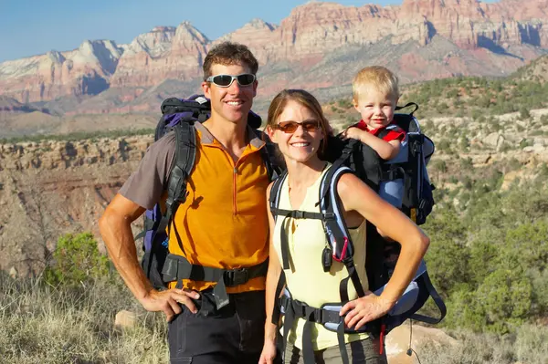 Family hiking outdoors in the Arizona desert near the West Valley of Phoenix