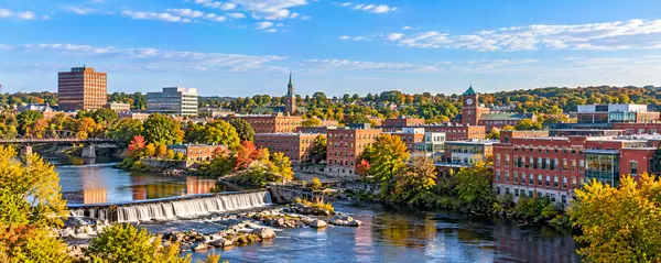 Autumn Riverfall Overlook of a Historic Mill Town