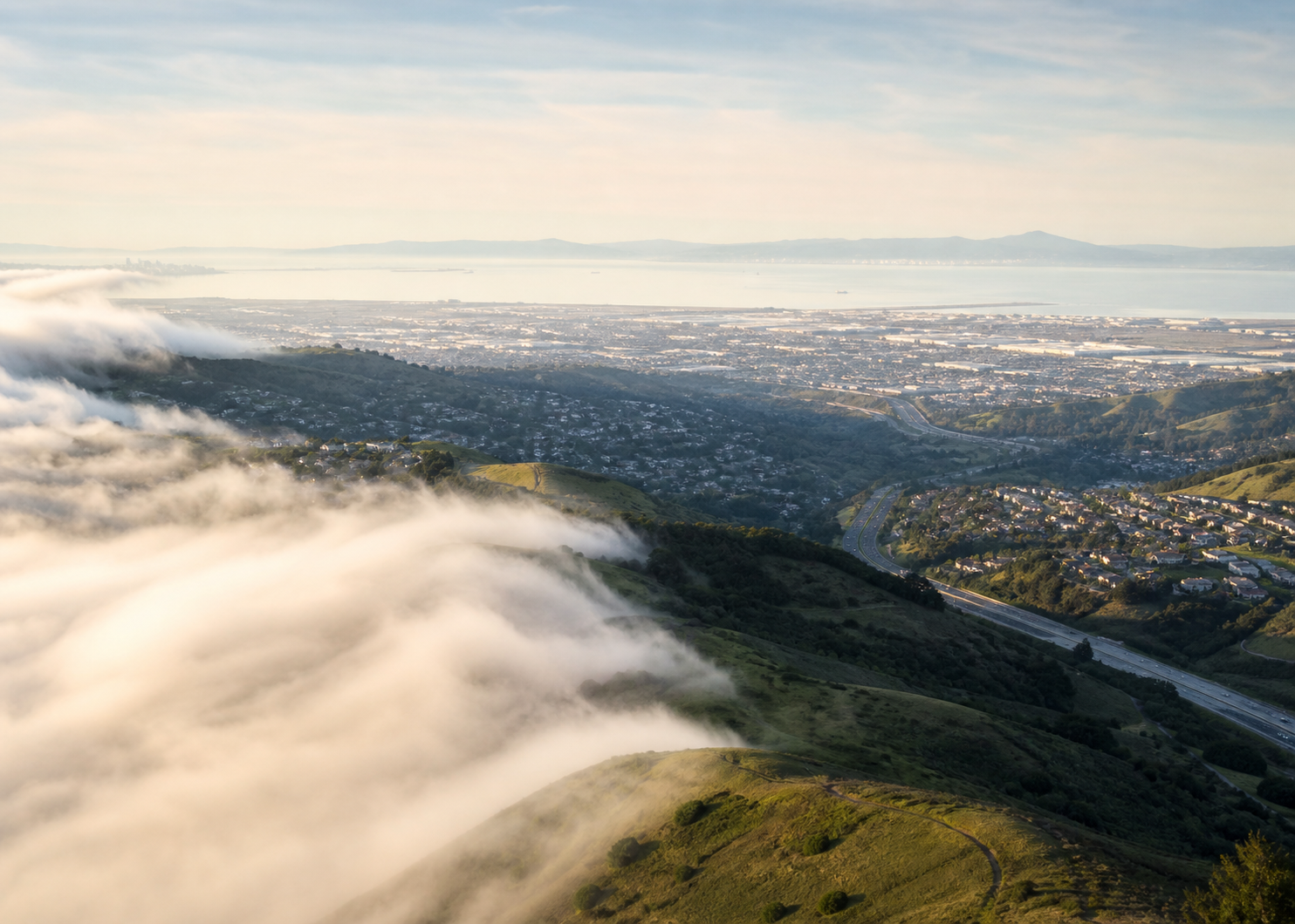 Peninsula hills with coastal fog rolling over the Bay Area