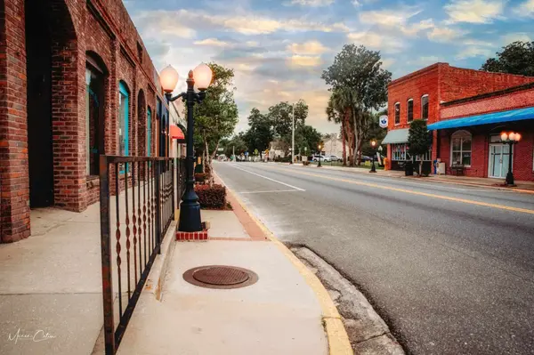 Historic brick storefronts in downtown Newberry, FL