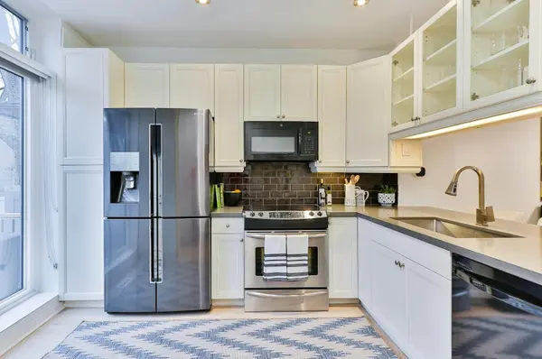 Modern kitchen with stainless steel appliances