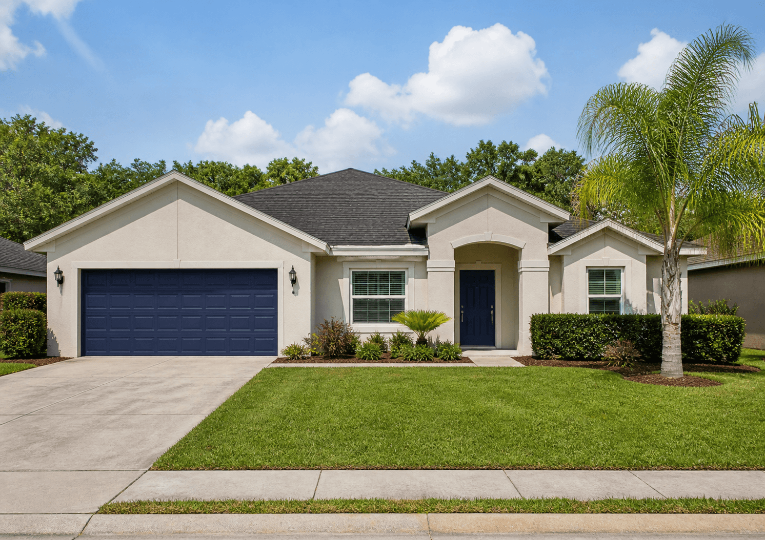 A Central Florida starter home with a green front lawn