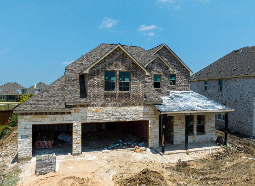 New construction home exterior in a North Texas community.