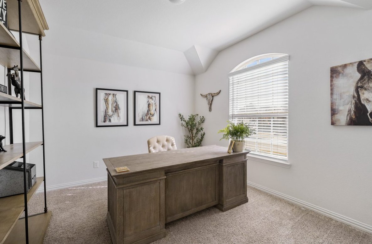 Home office desk in a North Texas home where an agent plans a move to a new brokerage